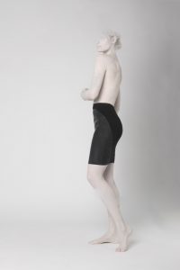 black latex and cotton skirt mix on a nude model nicoline hansen