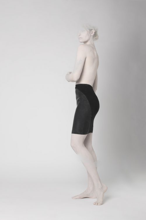 black latex and cotton skirt mix on a nude model nicoline hansen